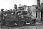 M8 Greyhound scout car of 3rd Cavalry Group (Mechanized), US Third Army observing German positions, northern France, 1944