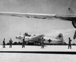 Aboard two Mitsubishi G4M ‘Betty’ bombers in surrender markings, a Japanese delegation stopped at Ie Jima, Ryukyu Islands en route Manila, Philippines for a surrender briefing, 19 Aug 1945. Photo 04 of 12.