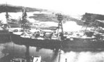 The battleships Nevada (background) and Arizona (foreground) being overhauled at the Norfolk Navy Yard, late 1929. Note Arizona’s new tripod masts that became so iconic in photos from the Pearl Harbor Attack.