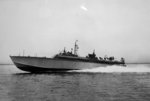 Broadside view of the Elco 80-foot torpedo boat PT-117 during trials off New York harbor, New York, United States, 1942.