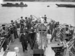 Quarter deck of sloop HMS Hind, 1944, with depth charge launchers along both rails and a depth charge rack at the stern. Note also the acoustic torpedo countermeasure Foxer noisemaker float atop the rack.