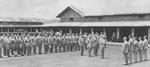 Lieutenant General Joseph Stilwell awarding medals, India, mid-1942