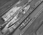 United States battleship USS Maryland and destroyers USS Hovey and USS Long in the Miraflores Locks while transiting the Panama Canal, 24 Apr 1931