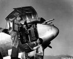 Armorers load .50 caliber ammunition into the four Browning M2 machine guns of a P-38 Lightning fighter with the USAAF 1st Fighter Group. 1944 photo probably taken at Salsola Airfield, part of the Foggia group, Italy.