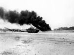 US Marines moving across Yontan Airfield, Yomitan, Okinawa, Japan, 1 Apr 1945