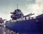 Battleship USS West Virginia, sunk in the Pearl Harbor Attack 7 Dec 1941 and then given temporary repairs at Pearl Harbor, is about to leave Hawaii for further repairs in the United States, 30 Apr 1943. Photo 1 of 3.