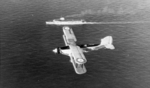 Fairey Seal aircraft flying past HMS Glorious, 1936