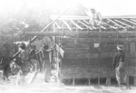 Members of US 5332nd Brigade (Provisional) building quarters for its colonel with locals, Burma, 1945, photo 3 of 4