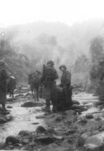 Members of US 5332nd Brigade (Provisional) at a stream in Burma, 1945; might be Holger Munson at left of photograph and Betz in center