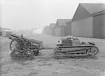 Carden Loyd Mark VI tankette towing a 3.7 inch QF Howitzer Mk I, circa 1929