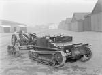 Carden Loyd Mark VI tankette towing a 3.7 inch QF Howitzer Mk I, circa 1929