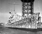 Cruiser Juneau coming alongside a pier at the New York Navy Yard in Feb 1942 prior to her commissioning. Note her modified Measure 12 paint scheme.