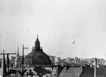 A V-1 buzz bomb falling into the Covent Garden area of London, England, United Kingdom, 14 Jun 1944, the second day of the V-1 assault on London.