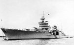 Cruiser USS Portland moored to a mooring buoy, unknown location, 1930s.