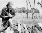 Ten-year-old Polish girl Kazimiera Mika mourning the death of her sister, caused by strafing German aircraft, near Jana Ostroroga Street, Warsaw, Poland, 13 Sep 1939, photo 2 of 2