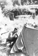 Bob Sindelar of US 5332nd Brigade (Provisional) shaving at Nampakka, Shan, Burma, Jan 1945