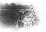 Two identified men of US 5332nd Brigade (Provisional) at a ration dump in northern Burma, Mar 1945