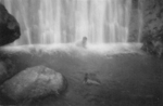 US serviceman in a waterfall, Fiji, 1942-1944