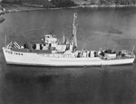 Patrol Craft PCS-1424 photographed on the Manitowoc River by her builder, the Burger Boat Company, Manitowoc, Wisconsin, United States, 24 Nov 1943. Note the Mousetrap anti-submarine rocket rails on the foredeck.