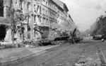 ISU-152 self-propelled guns and a T-34-85 tank on Kisfaludy Street, Budapest, Hungary, 30 Oct 1956, photo 4 of 4