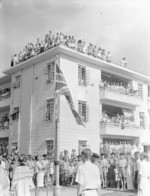 Flag raising ceremony, Stanley Internment Camp, Hong Kong, 30 Aug 1945