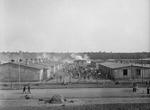 Bergen-Belsen Concentration Camp as seen from outside the wire, 17 Apr 1945.