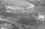 Aerial view of the slips of Tecklenborg shipyard and the twisting Geeste River, Bremerhaven, Germany, circa 1910s