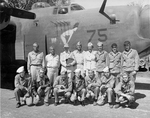 First lady Eleanor Roosevelt upon arrival at Espiritu Santo, New Hebrides during her tour of the South Pacific on behalf of the Red Cross, 14 Sep 1943. She is flanked by VAdm Aubrey Fitch and MGen Maxwell Murray.