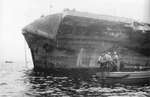 Damage from Typhoon Connie to the forward flight deck of USS Bennington as seen after the ship’s arrival in San Pedro Bay, Leyte, Philippines, 12 Jun 1945. Photo 3 of 3.