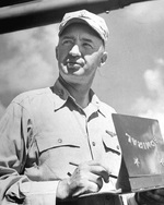 Rear Admiral J.J. Clark, commander of the carrier Task Group built around USS Hornet (Essex-class), on the bridge of his flagship, late 1944 or early 1945.