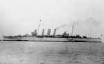 Broadside view of the cruiser HMS Cumberland, before her 1935 refit. Location unknown.