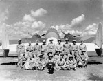 Group photo of the USAAF 3rd Mapping Squadron standing in front of a B-36 Lexington bomber during a stopover at Borinquen Field, Puerto Rico on their way to South America, 1942.