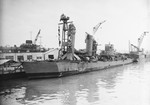 Destroyer USS Shaw shortly after her arrival at Mare Island Naval Shipyard, Vallejo, California, United States, 18 Feb 1942. Note her temporary bow fitted at Pearl Harbor, Hawaii. Photo 1 of 2.