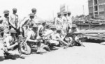 US Marines in Shanghai, China, mid-1937; note M1917 helmets, Thompson submachine gun, M1918 Browning Automatic Rifle, and M1917 machine gun