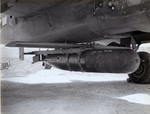 US Navy or Marines PBJ Mitchell bombers fitted with Mark XIII torpedoes with break-away glide wings to extend aerial range, 1945. Photo 1 of 2.