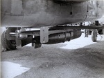 US Navy or Marines PBJ Mitchell bombers fitted with Mark XIII torpedoes with break-away glide wings to extend aerial range, 1945. Photo 2 of 2.