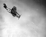 Grumman TBF Avenger firing HVAR air-to-surface rockets at a United States test range, mid-1944.