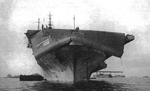 Damage from Typhoon Connie to the forward flight deck of USS Bennington as seen after the ship’s arrival in San Pedro Bay, Leyte, Philippines, 12 Jun 1945. Photo 2 of 3.