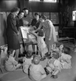 WAAF members who were training to become instructors of the RAF Educational and Vocational Training Scheme visiting a children