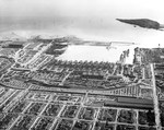 Aerial view of Permanente Metals Shipyard No. 2 looking south into San Francisco Bay, Richmond, California, United States, 11 Dec 1944. Note Brooks Island just offshore.