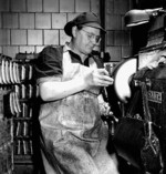 Male worker at the Small Arms Ltd. plant, Mississauga, Ontario, Canada, date unknown