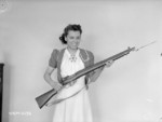 Female worker at the Small Arms Ltd. plant, Mississauga, Ontario, Canada, date unknown