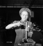 Female worker at the Small Arms Ltd. plant, Mississauga, Ontario, Canada, date unknown