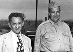 William Laurence with one of his characteristically loud neckties and Major General Leslie Groves at the Trinity test site during a press visit, Sep 1945.