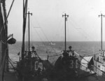 Submarines S-40, S-38, and S-41 (left to right) moored along side USS Canopus, Qingdao, Shandong Province, China, 1930; note another submarine approaching