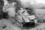 Wrecked Light Tank Mk VIC on a road between Huppy and Saint-Maxent, Picardy, France, 27-29 May 1940