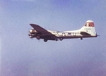 Movie still of a B-17G Fortress with the 92nd Bomb Group flying from RAF Podington in Bedfordshire, England fitted with two Disney Bombs in underwing bomb racks, Feb 1945. Photo 2 of 2.