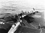 Escort carrier USS Steamer Bay launching two F6F Hellcat fighters as replacement aircraft for Task Force 38 aircraft carriers, fall of 1944 in the Philippine Sea. Note the radome on one of the Hellcats.