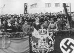 German diplomat Wilhelm Fabricius, Iron Guard leader Horia Sima, General Ion Antonescu, King Mihai I, and others at a celebration for the Romanian entry into the Tripartite Pact, Romania, Nov-Dec 1940