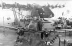 Fw 58 Weihe (foreground), Fw 190 (right of photograph), and Me 323 Gigant (background) aircraft being serviced, early 1944